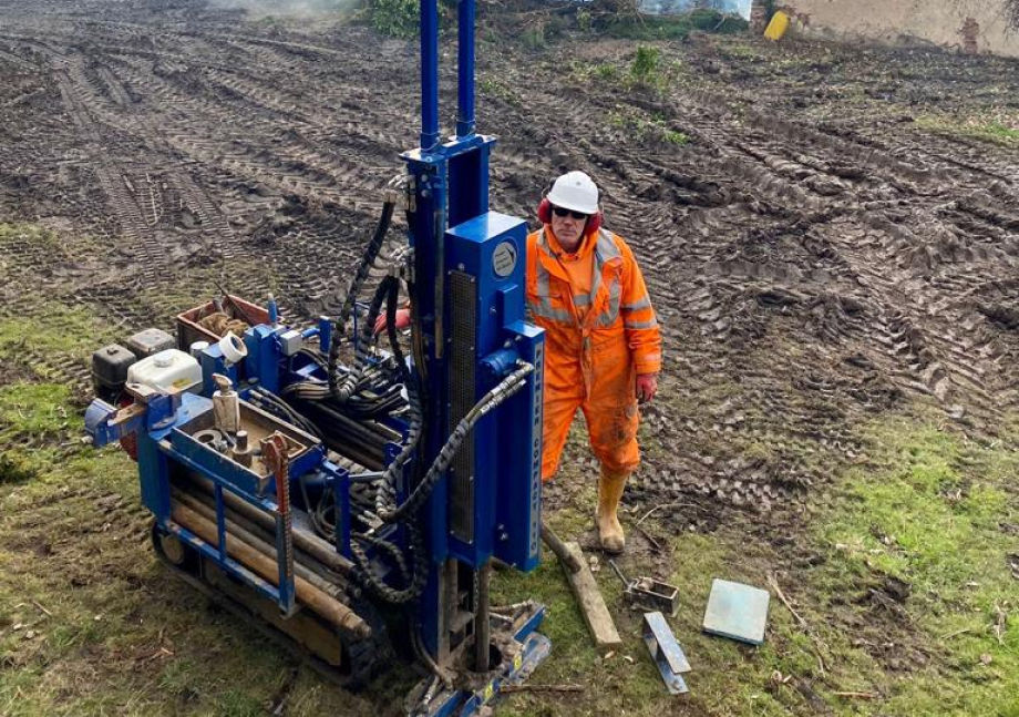 Man using drilling rig