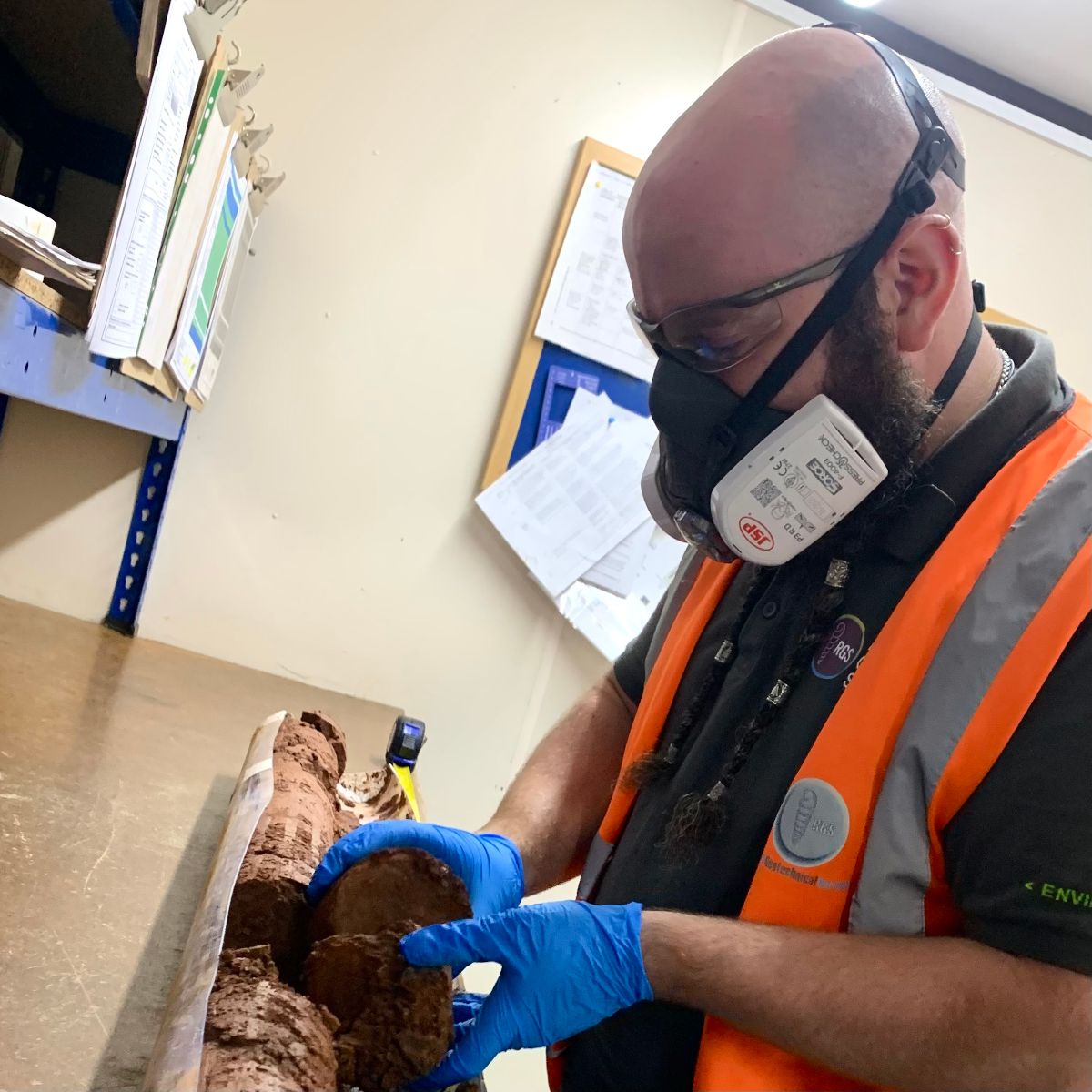 Man examining test sample